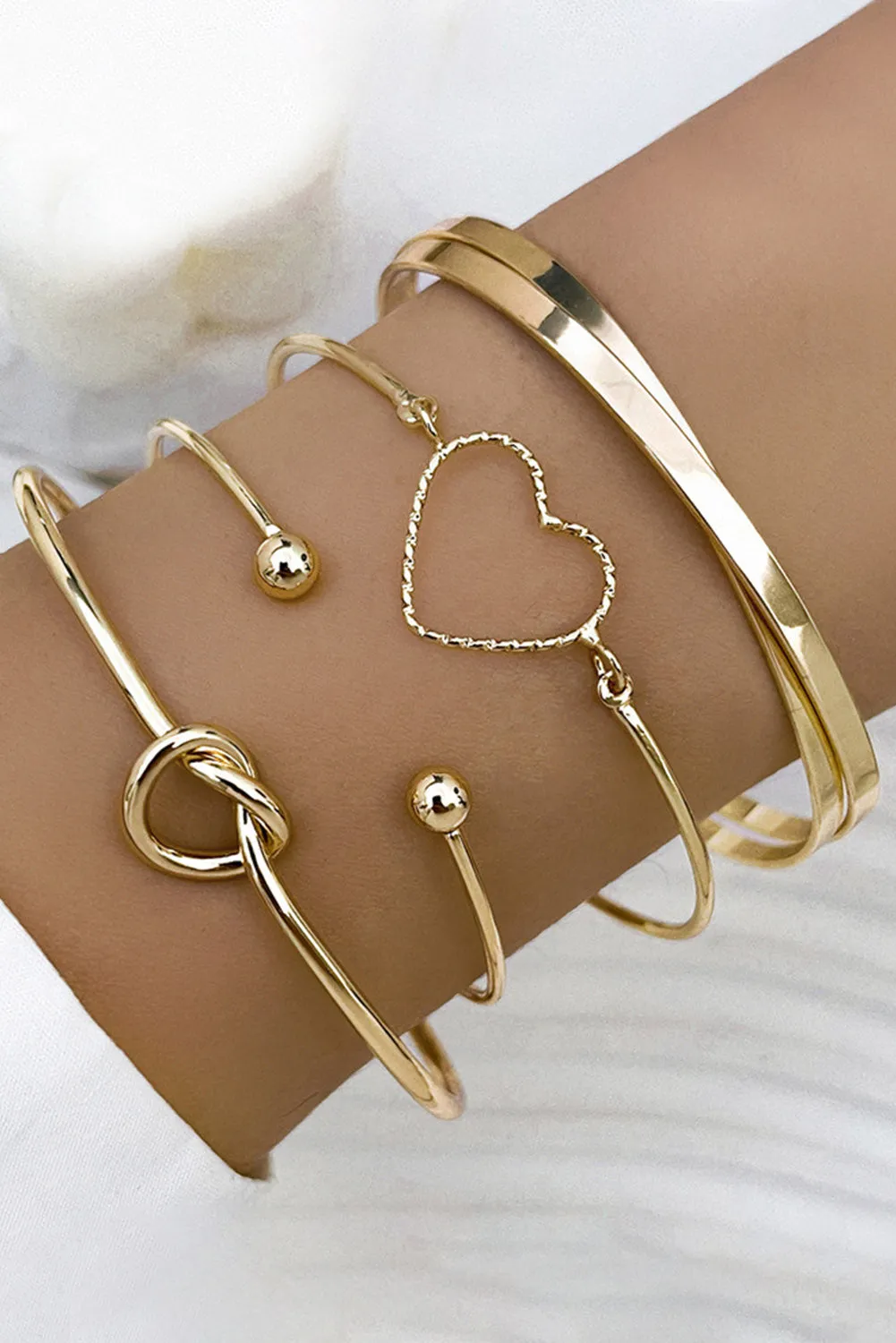 Gold Love Geometric Cross Bracelet Set - 4-Piece Ensemble for Versatile Styling, Elegant Gold Tone, Layering Bracelets