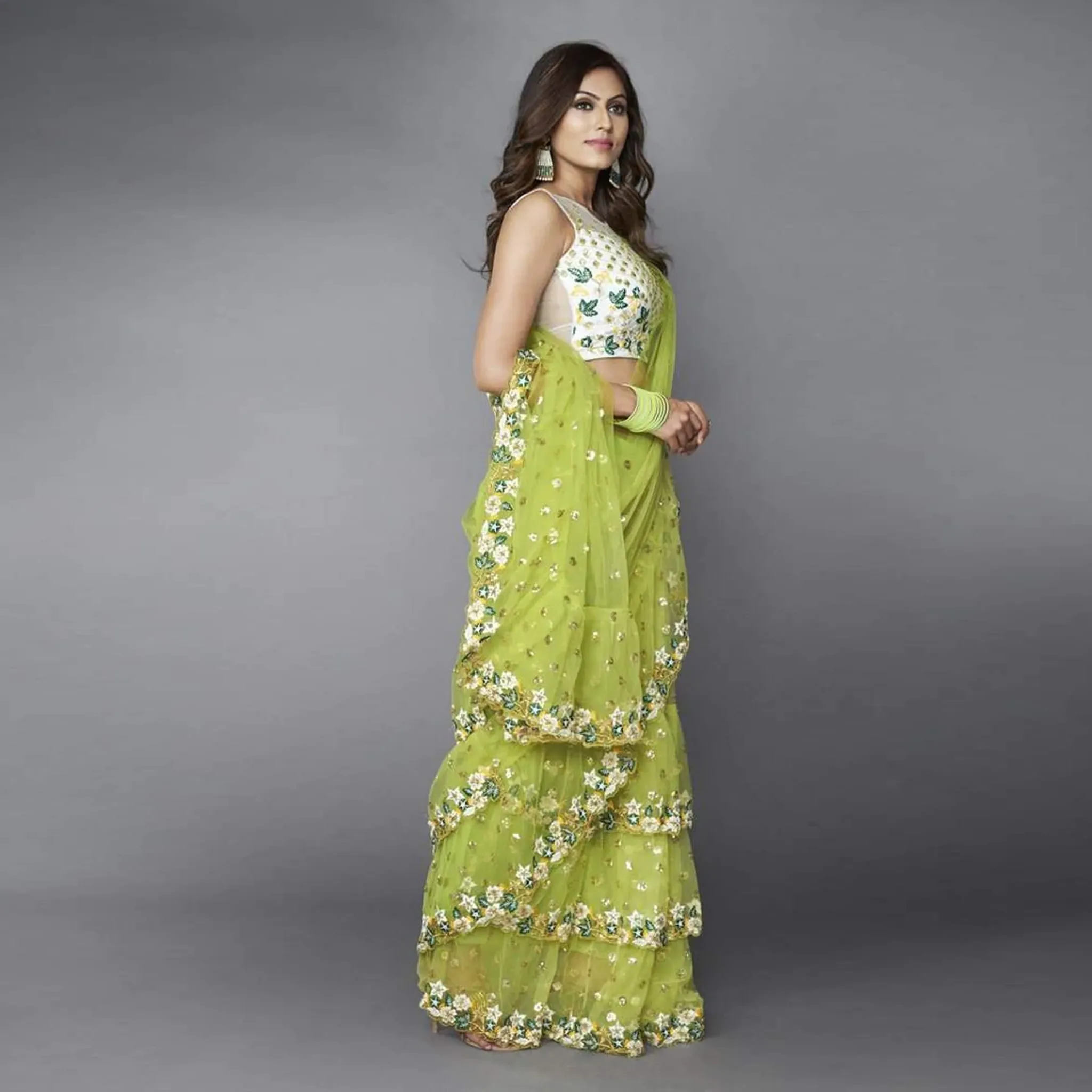 Green Ruffle Saree in Soft Net Fabrics with Embroidery Work