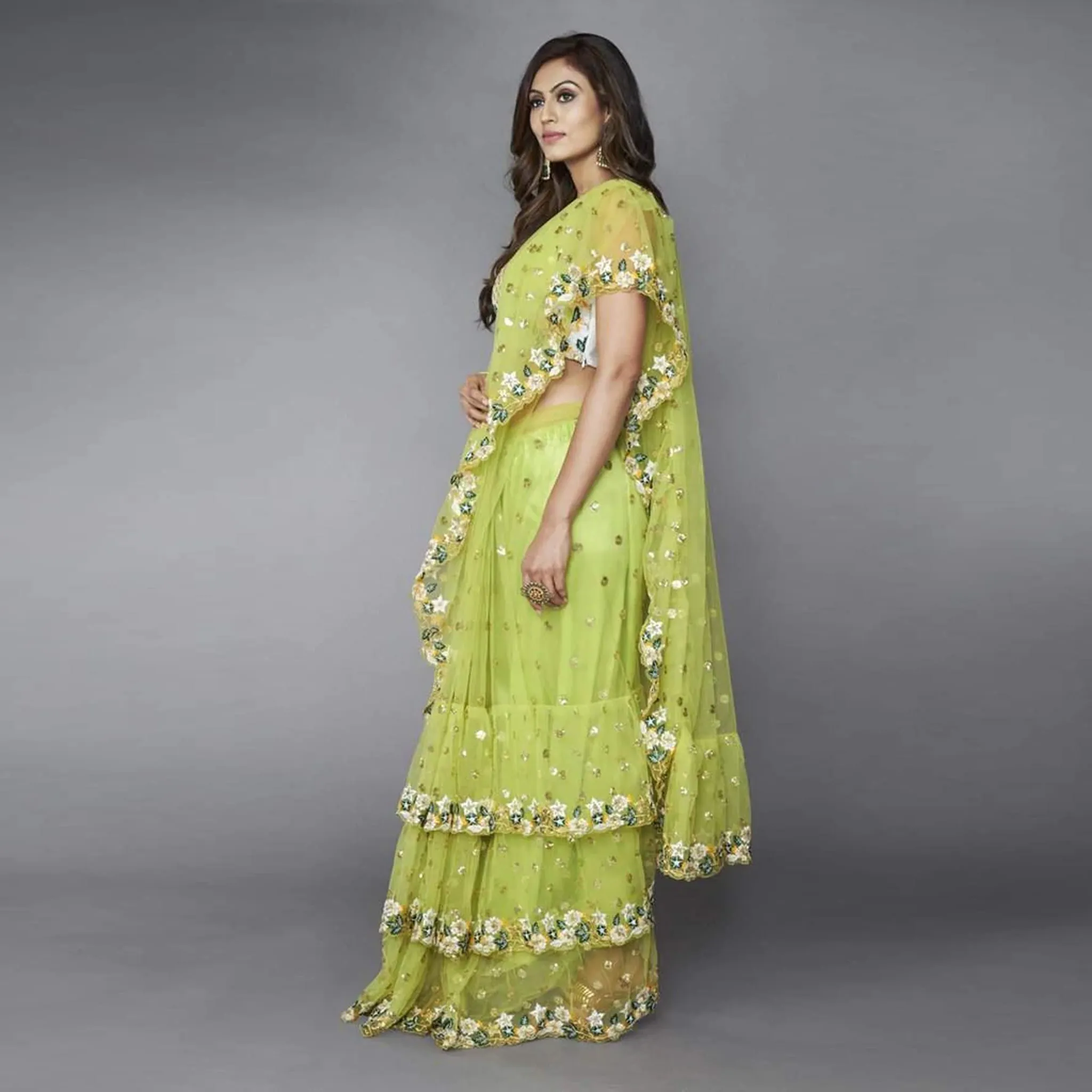 Green Ruffle Saree in Soft Net Fabrics with Embroidery Work