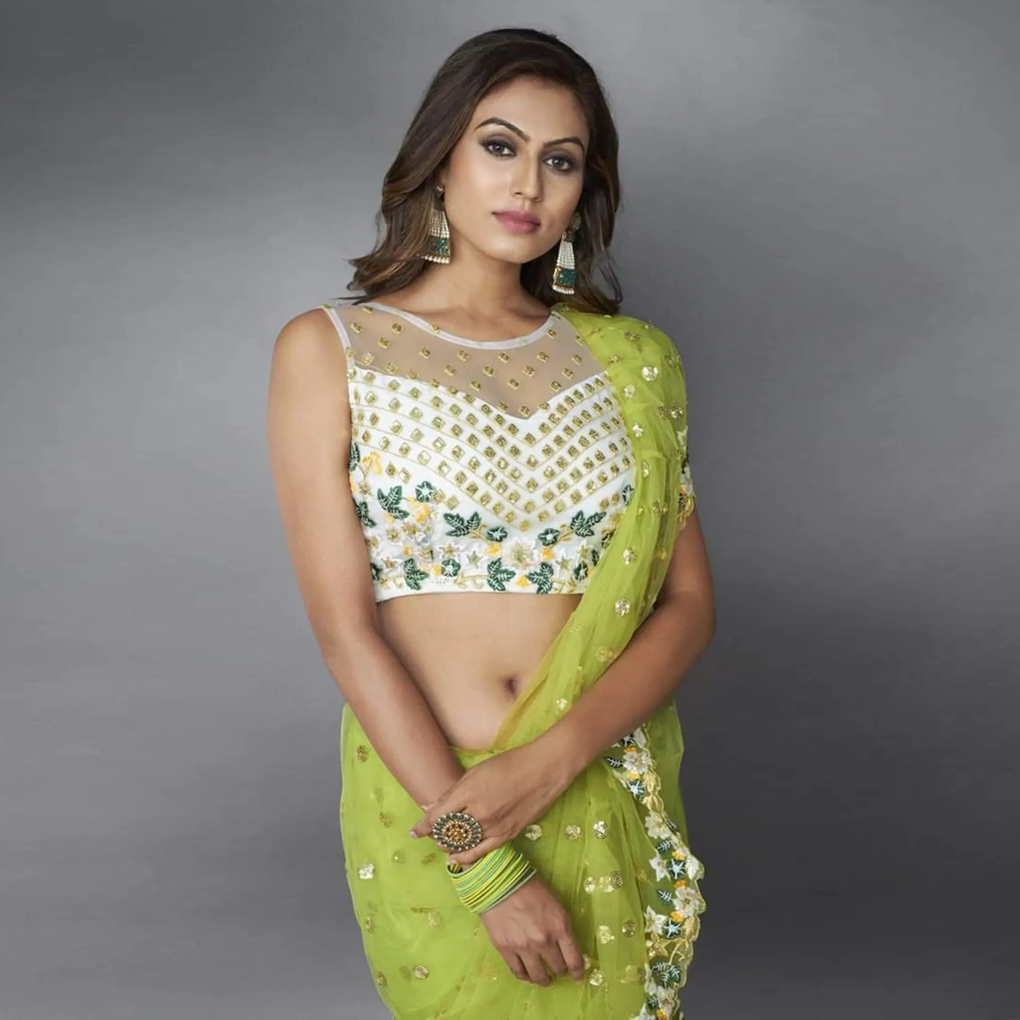 Green Ruffle Saree in Soft Net Fabrics with Embroidery Work